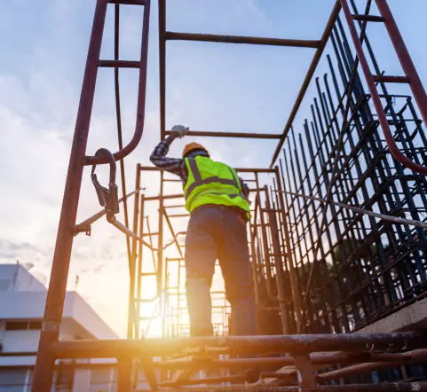 Construction Worker During Sunset — Construction Business