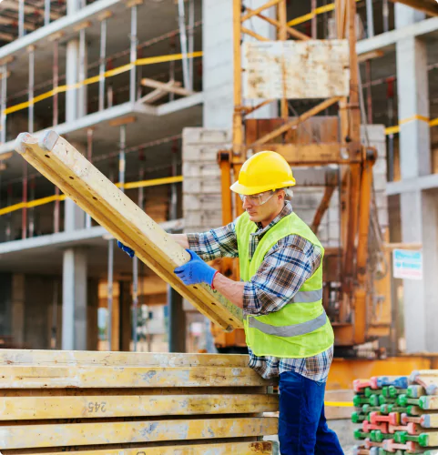 Construction Worker Lifting Materials