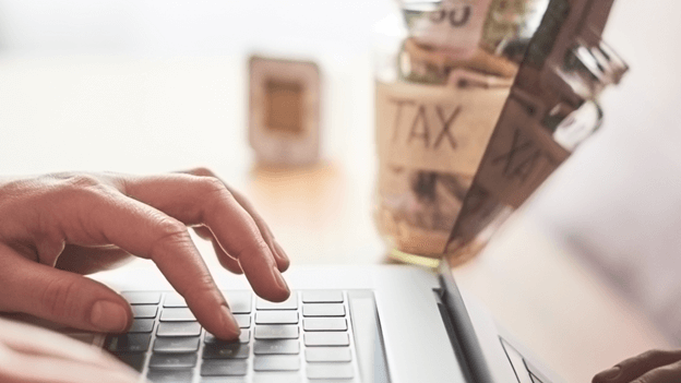 Electronic Filing - Hand typing on a keyboard
