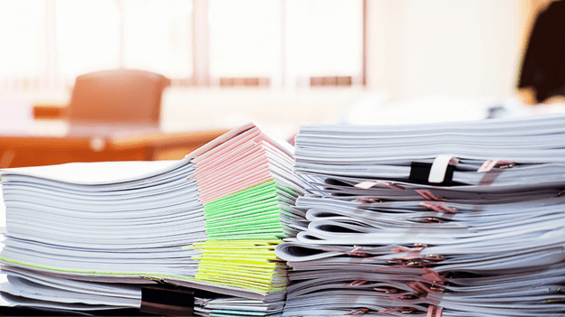 Stack of Papers With Binders