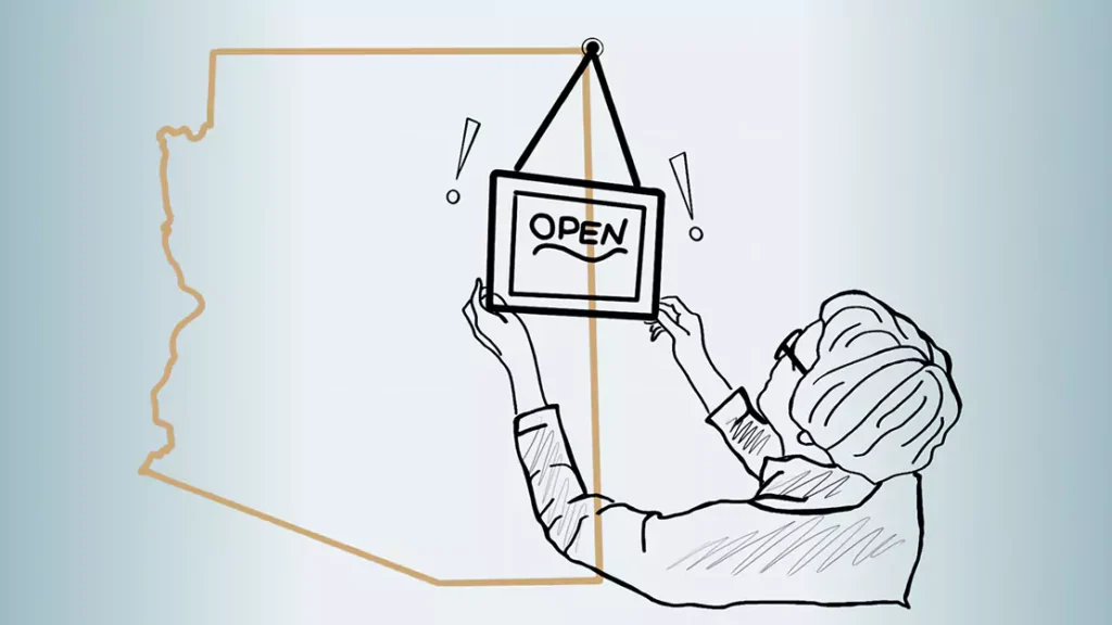 Business owner flipping the Open Signage