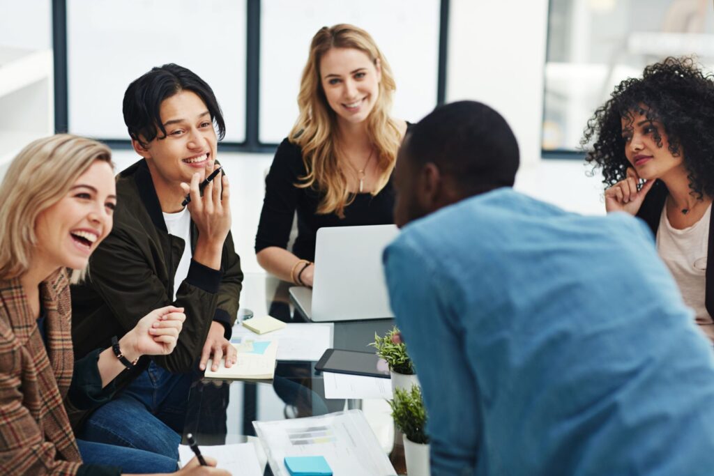 A group of young professionals working together at a table