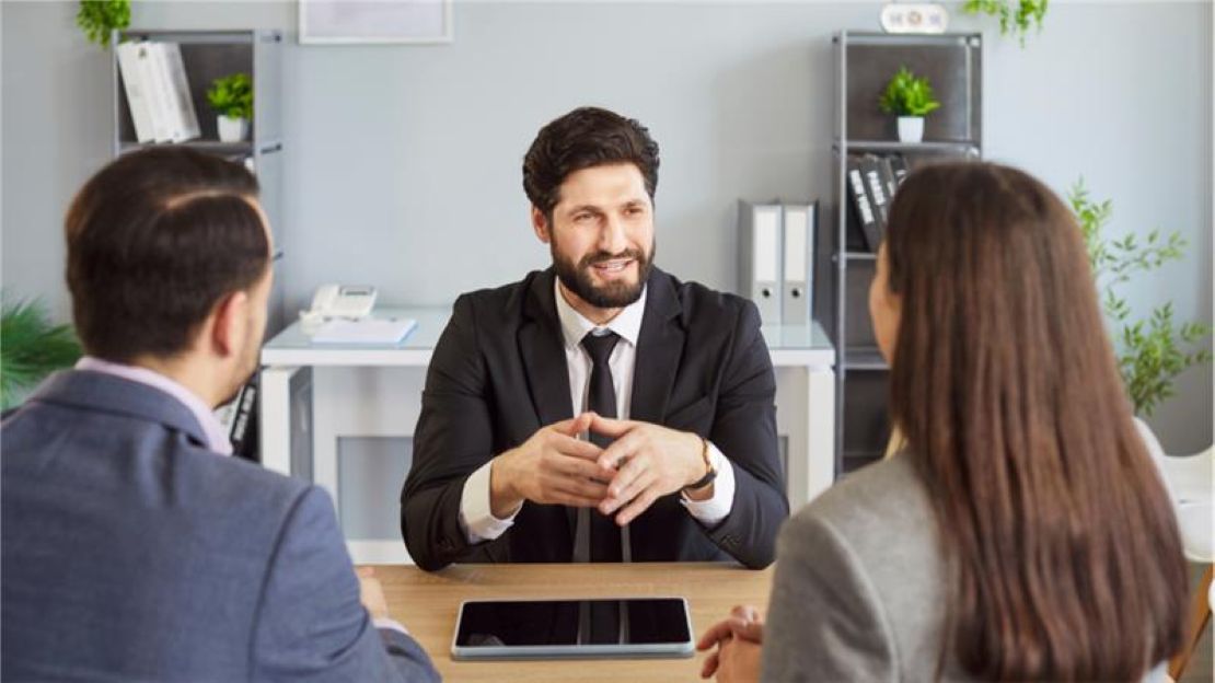 Three Person Having a Meeting