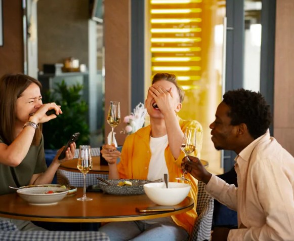 Customers Enjoying their Meal in Restaurant
