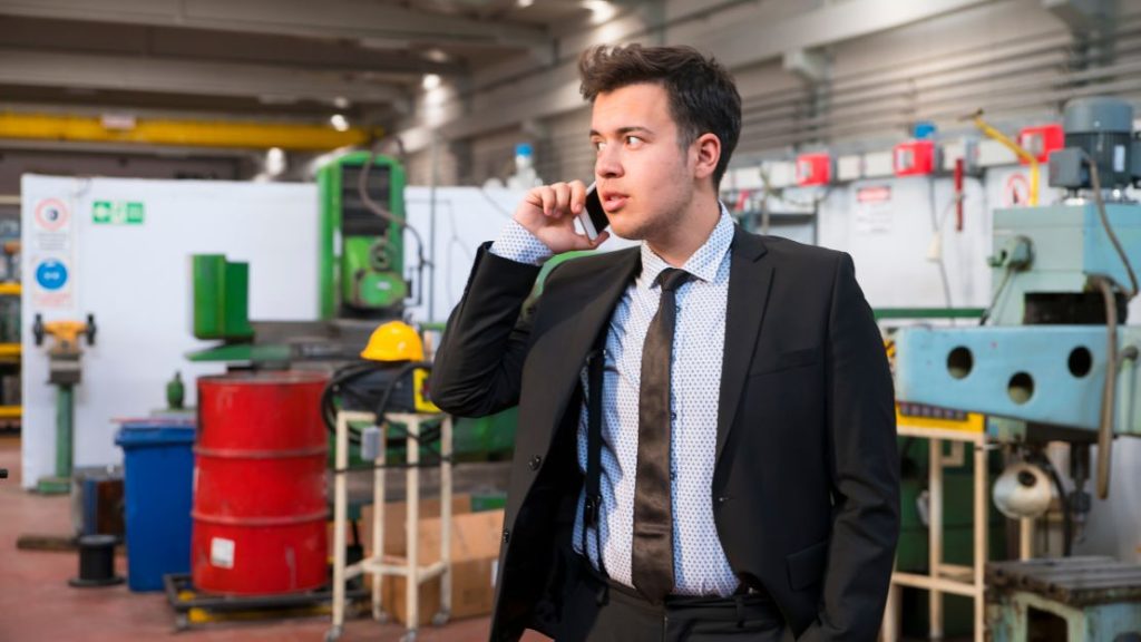 Man in suite taking phone call