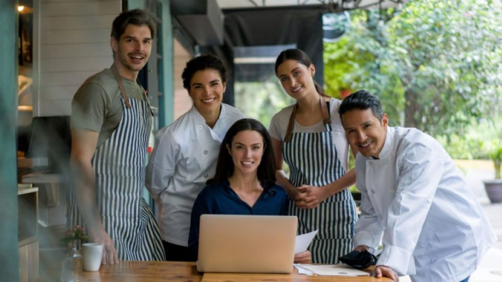 Restaurant staff smiling at the camera