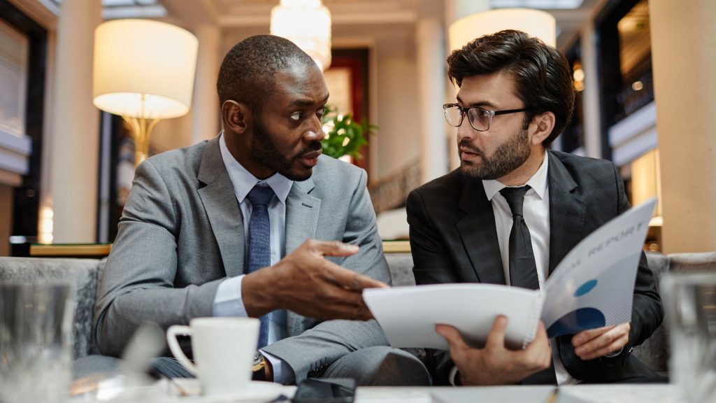 Two business professionals in suits