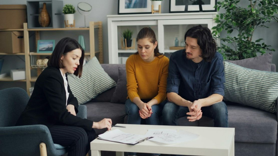 A Couple Talking to Advisor