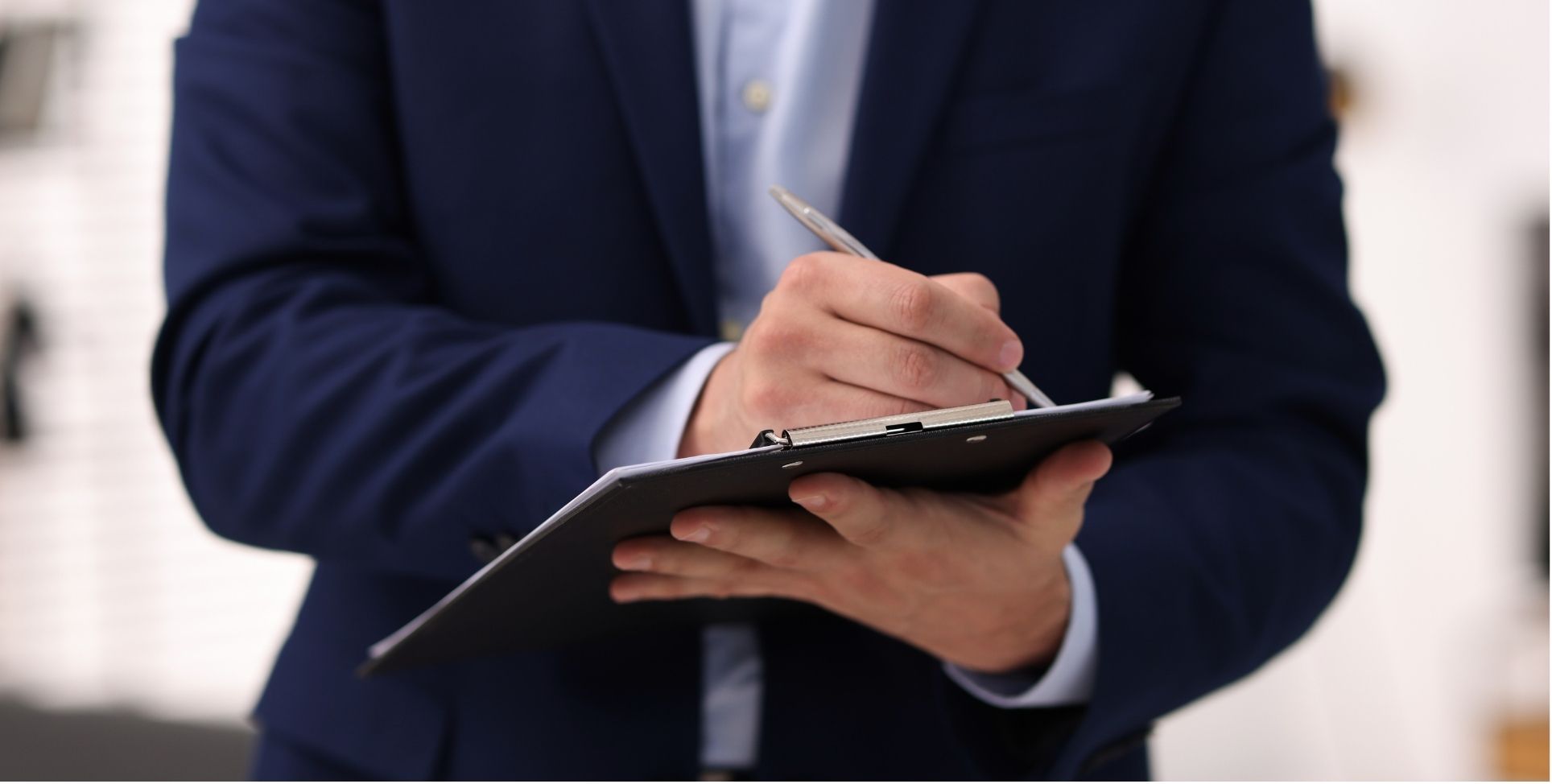 Business Valuation Man holding Checkboard